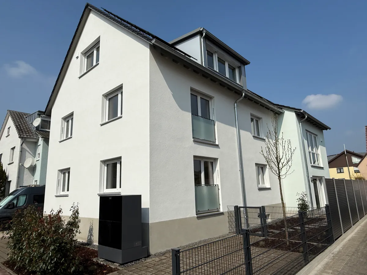 Umbau + Erweiterung 3-Familienhaus