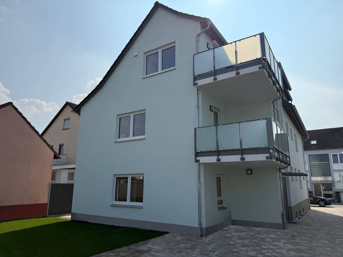 Umbau + Erweiterung 3-Familienhaus