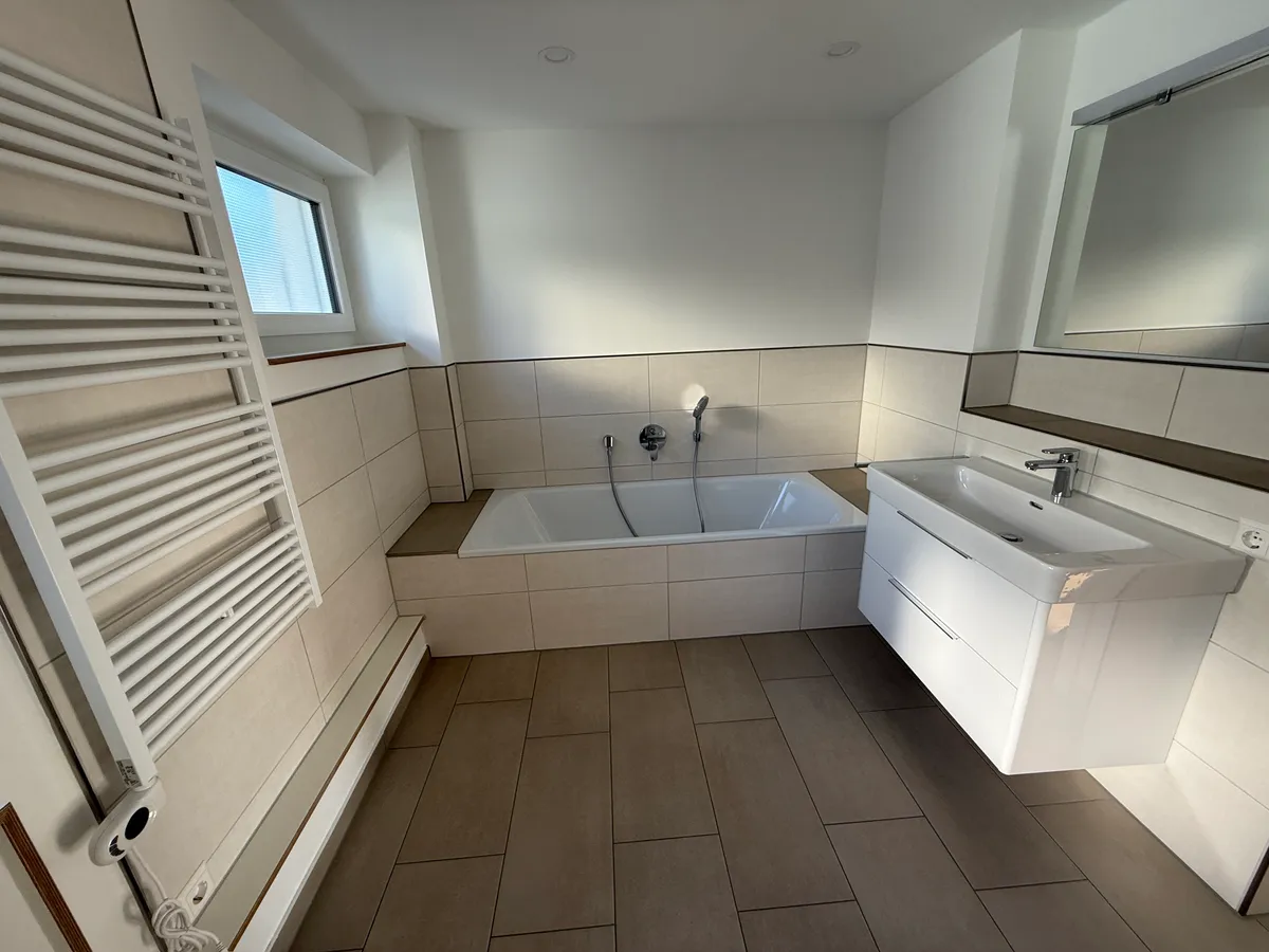 Umbau + Erweiterung 3-Familienhaus